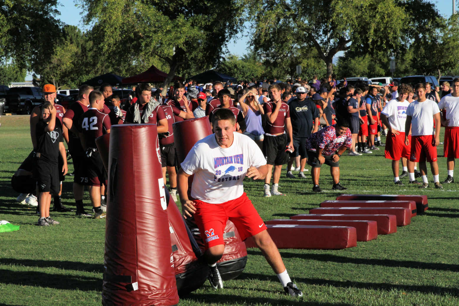 Football player runs through an obstacle